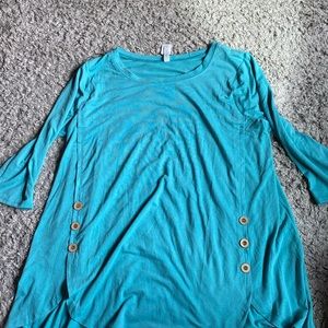 Two of the exact same top, different color